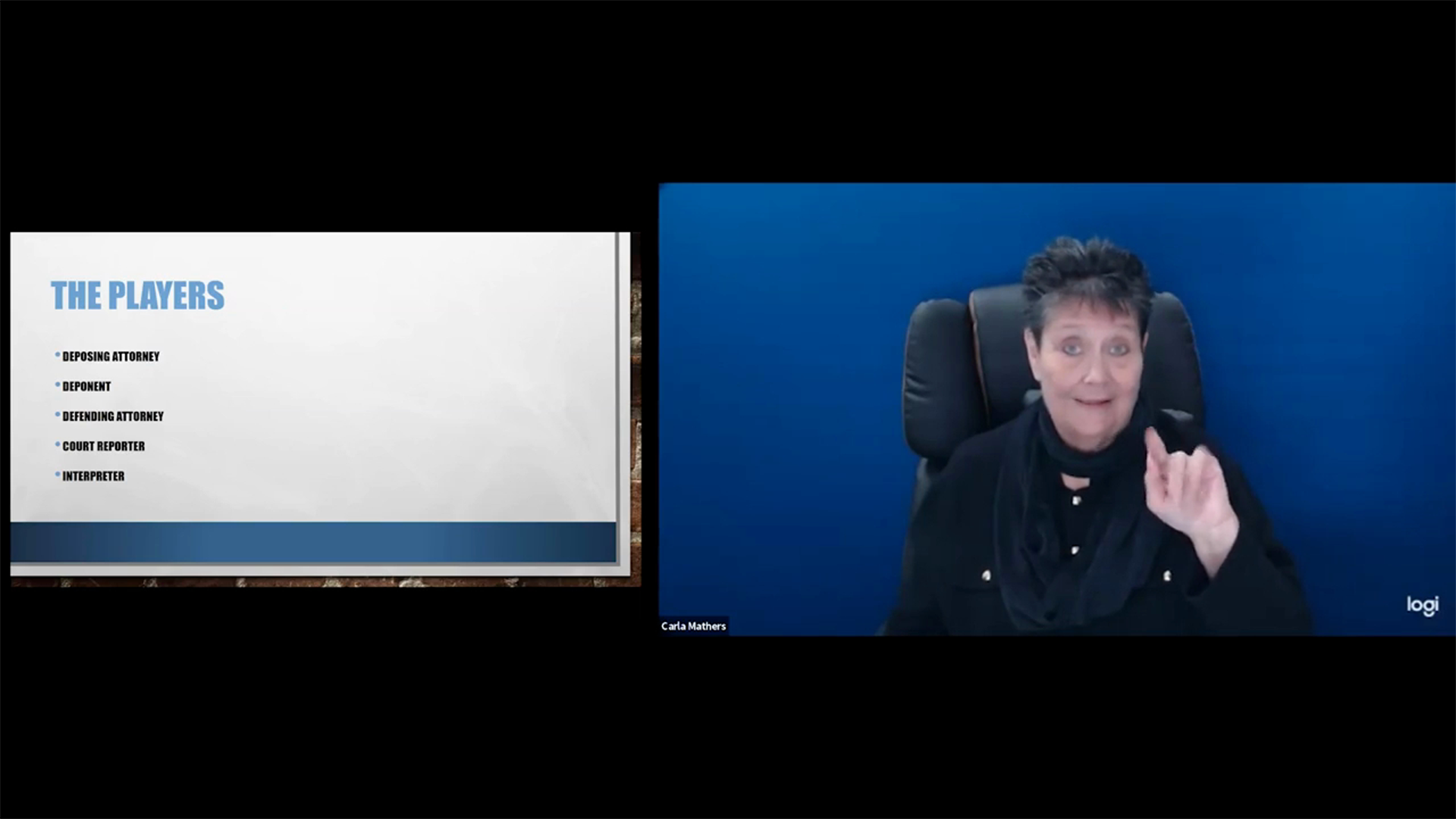 A title slide reads "THE PLAYERS" followed by a bulleted list: "DEPOSING ATTORNEY," "DEPONENT," "DEFENDING ATTORNEY," "COURT REPORTER," and "INTERPRETER." A woman with short dark hair, wearing a black top and scarf, is signing from a black office chair.