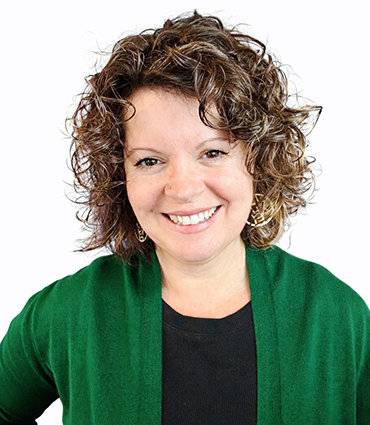 Professional headshot of Kelly Matamoros.