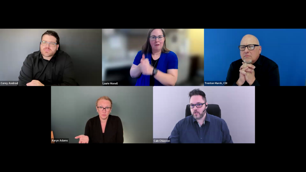A screenshot of a virtual panel discussion shows five participants arranged in a grid layout against solid or office backgrounds. The top row features moderator Corey Axelrod, panelist Laurie Monell (who is actively signing), and panelist Trenton Marsh, while the bottom row displays ASL/English interpreters Aaryn Adams and Cain Chiasson.