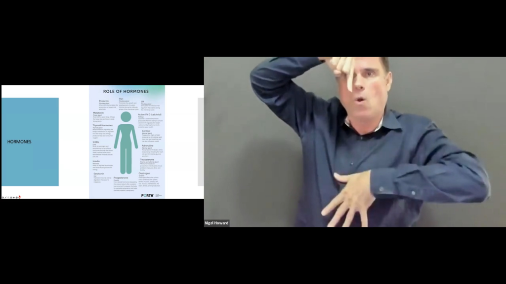 A split-screen screenshot from a virtual presentation. On the left side, a presentation slide titled "ROLE OF HORMONE" features an infographic of a human silhouette surrounded by text labels for various hormones (such as Prolactin, Melatonin, Insulin, Thyroid Hormones, FSH, LH, and Estrogen). On the right side, presenter Nigel Howard, a man in a dark button-down shirt, is actively presenting using sign language against a plain gray background. A small name overlay in the bottom-left corner of his video window reads "Nigel Howard".